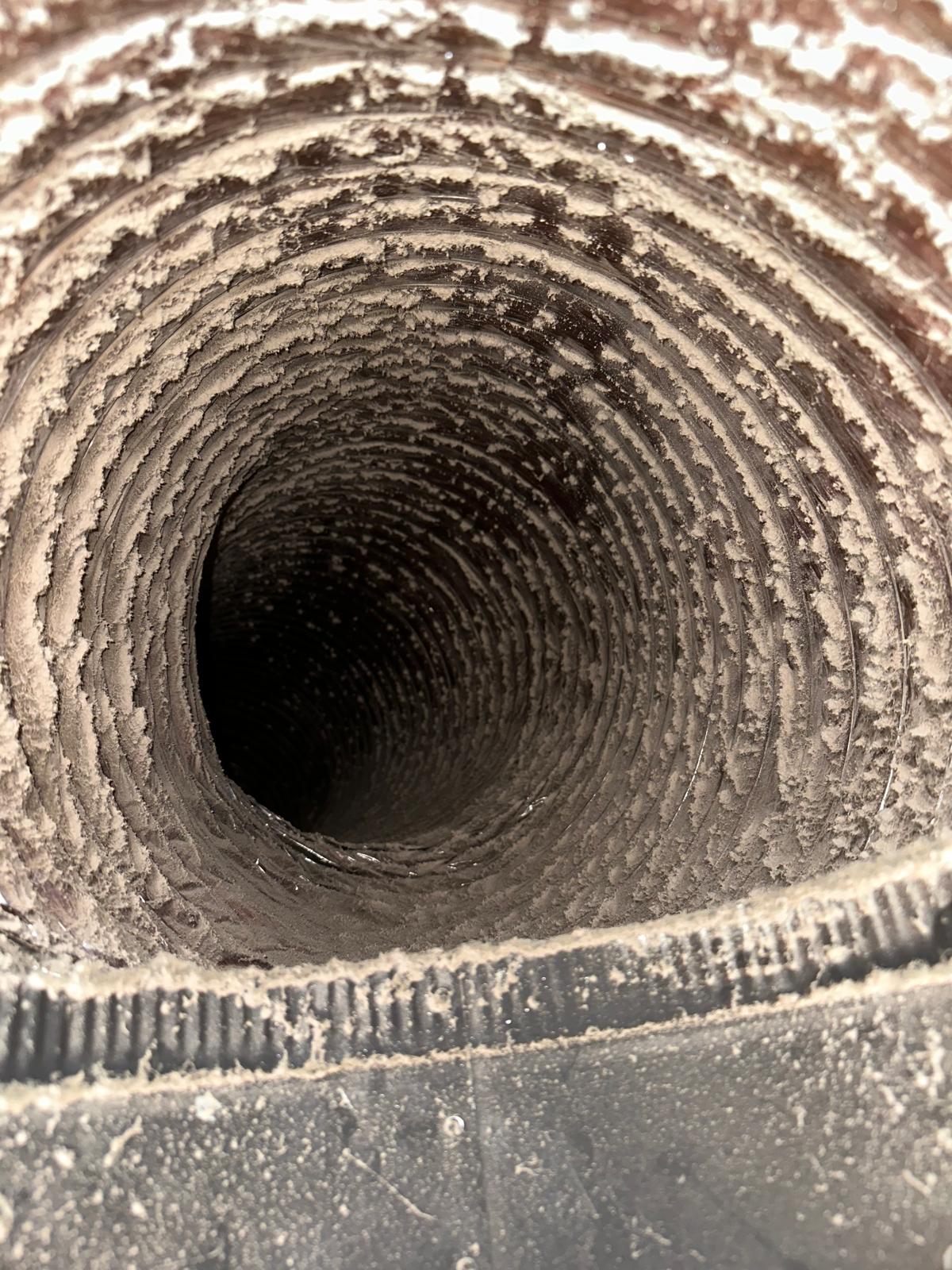 Dirty HVAC ductwork before residential attic cleaning in Hewitt, NJ